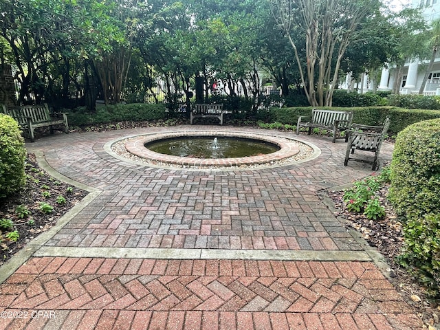 view of home's community featuring a patio