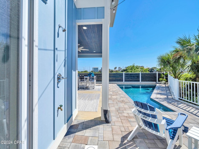 view of pool featuring a patio area