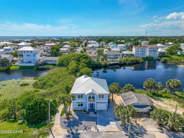 birds eye view of property featuring a water view