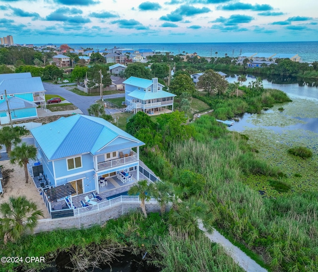 drone / aerial view featuring a water view