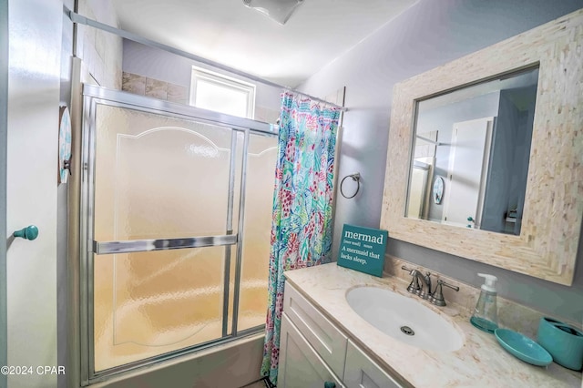 bathroom with shower / bath combo and vanity