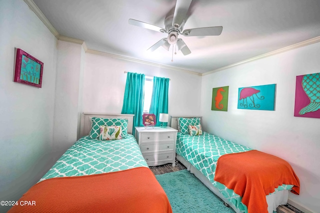 bedroom featuring crown molding, ceiling fan, and dark wood-type flooring