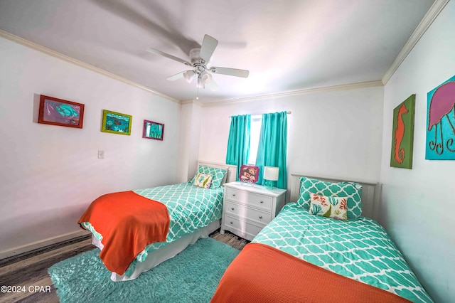 bedroom with ornamental molding, ceiling fan, and hardwood / wood-style flooring