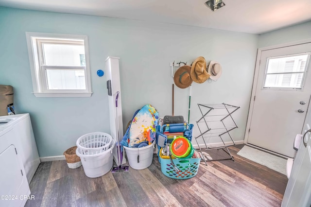 recreation room featuring washer / dryer and hardwood / wood-style flooring