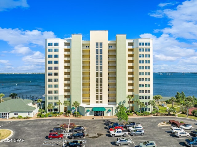 view of building exterior featuring a water view