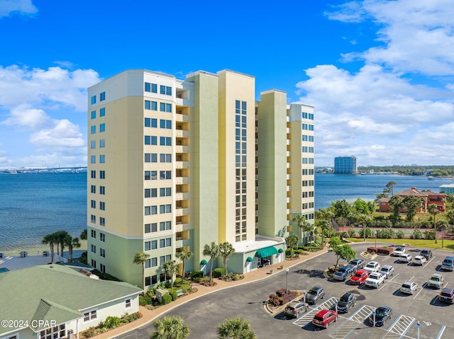 view of building exterior featuring a water view