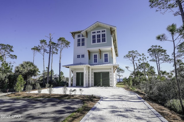 view of front of home with a garage