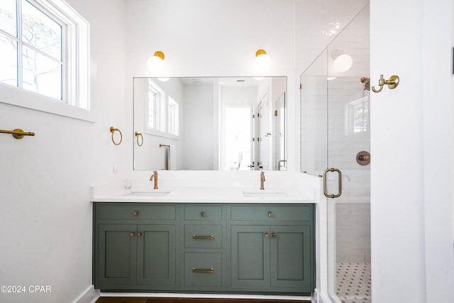 bathroom with vanity and an enclosed shower