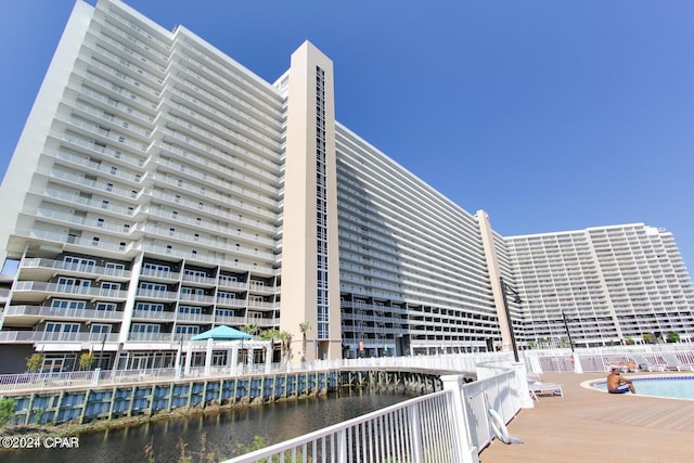 view of building exterior featuring a water view