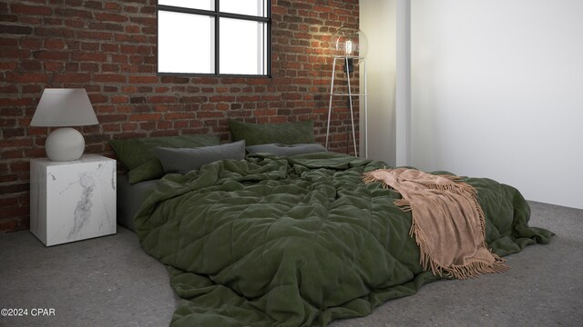 bedroom with brick wall