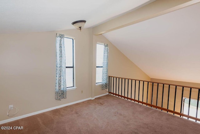 bonus room with carpet, vaulted ceiling with beams, and baseboards