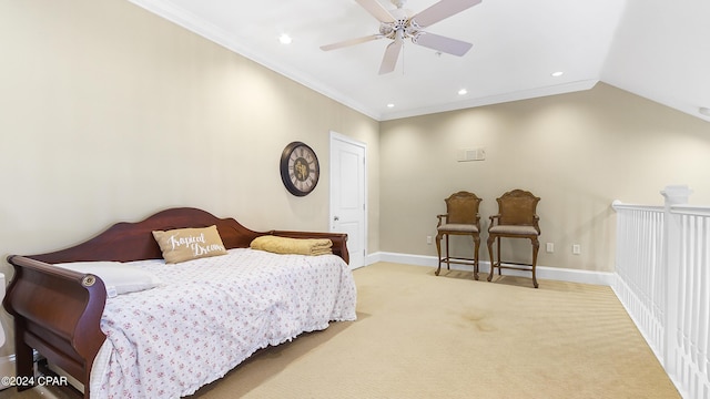 bedroom with ceiling fan, light colored carpet, lofted ceiling, and ornamental molding