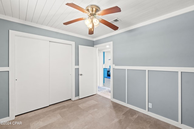 unfurnished bedroom featuring wooden ceiling and ceiling fan