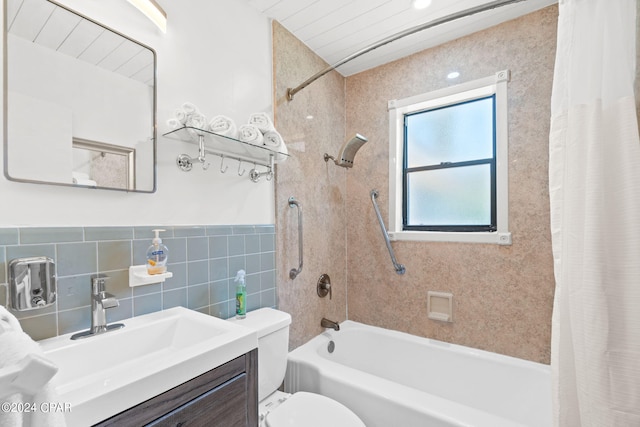 full bathroom featuring tile walls, backsplash, shower / bath combo, toilet, and vanity