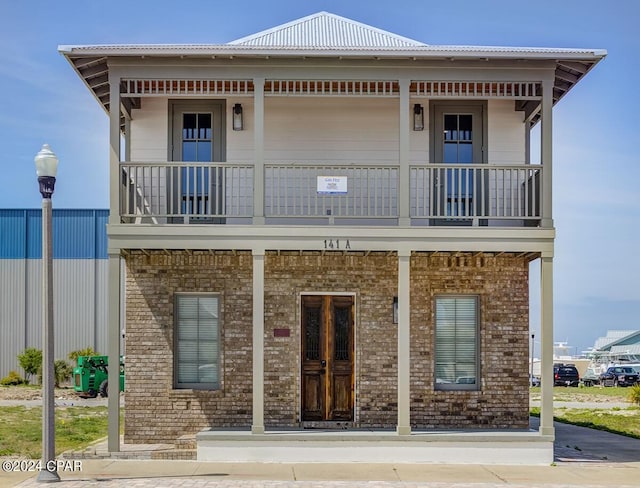 exterior space with a balcony