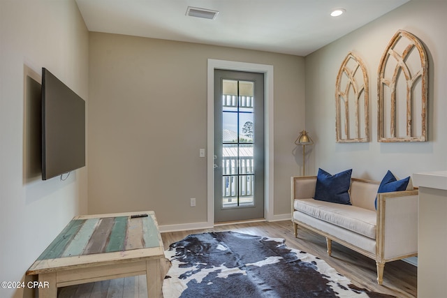 entryway with light hardwood / wood-style floors