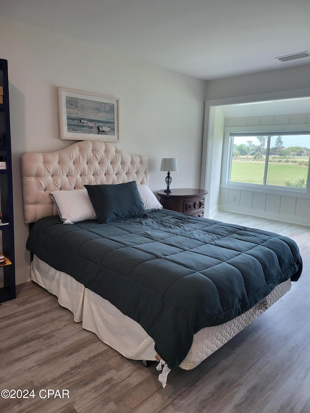 bedroom featuring hardwood / wood-style flooring