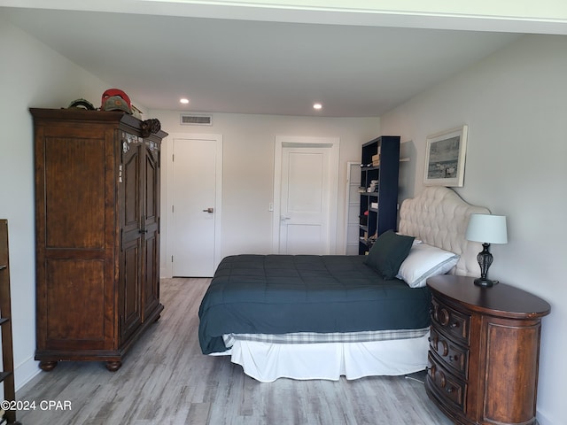 bedroom featuring light hardwood / wood-style flooring