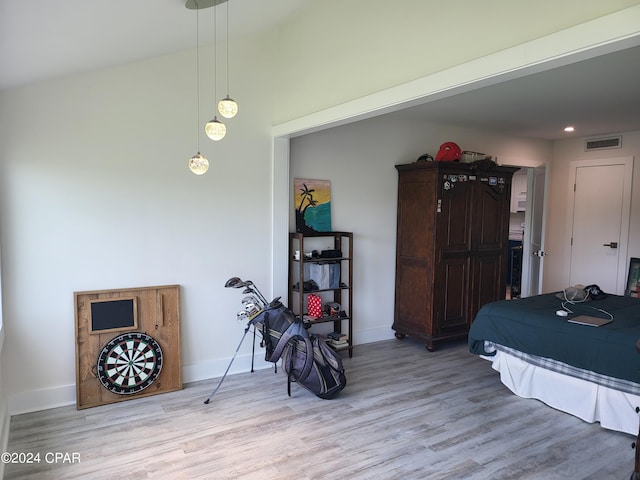 bedroom with light wood-type flooring