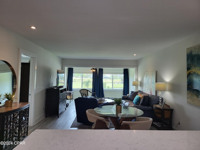 dining area with dark hardwood / wood-style flooring