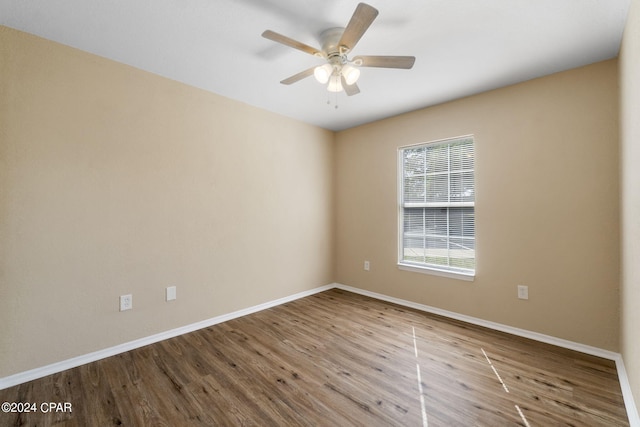 unfurnished room featuring wood-type flooring and ceiling fan