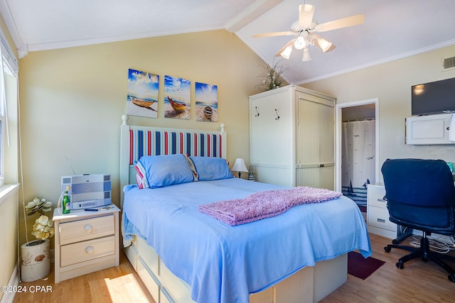 bedroom featuring ornamental molding, ceiling fan, vaulted ceiling with beams, and light hardwood / wood-style flooring