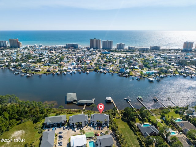 drone / aerial view with a water view