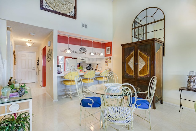 view of tiled dining space