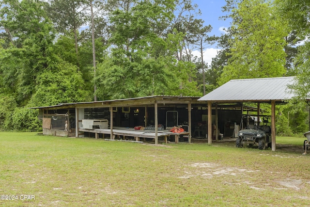 exterior space with a yard