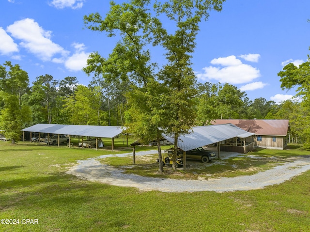 view of yard featuring a carport