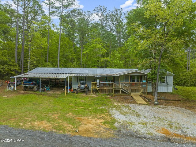 view of front of house with a carport