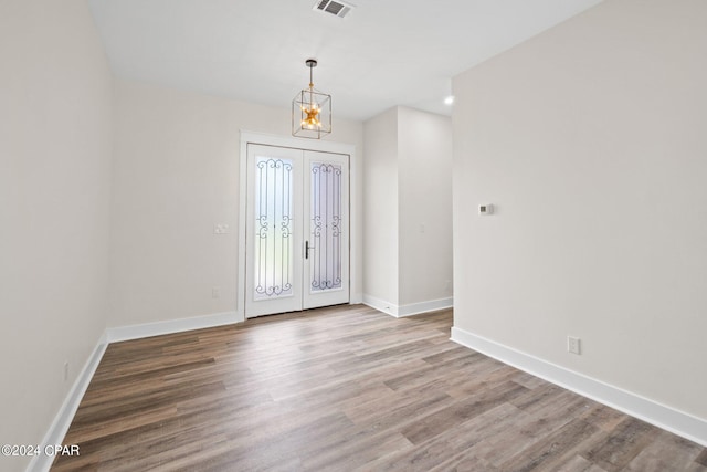 foyer with hardwood / wood-style floors