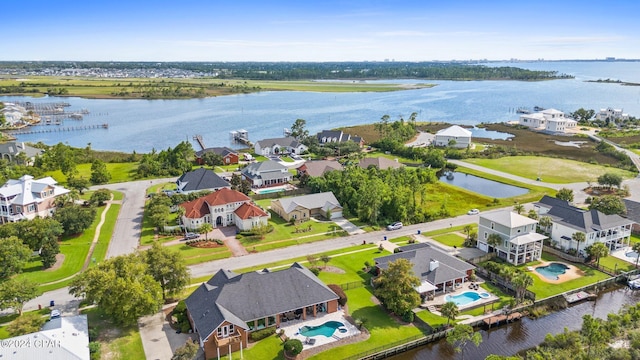 bird's eye view with a water view