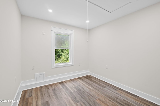 unfurnished room featuring wood-type flooring