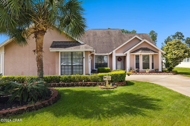 view of front of home with a front yard