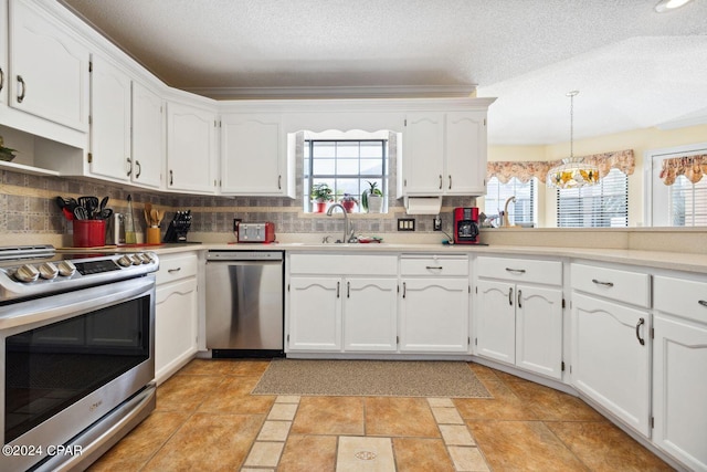 kitchen featuring light tile flooring, backsplash, and stainless steel appliances