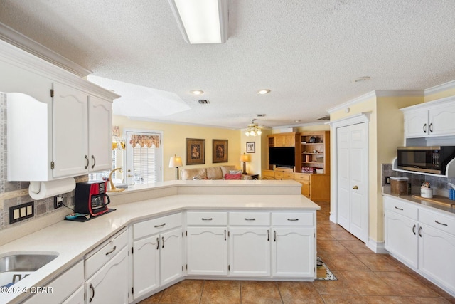 interior space with a healthy amount of sunlight, light wood-type flooring, and crown molding