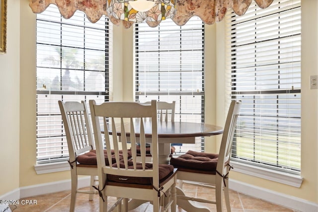 view of tiled dining space