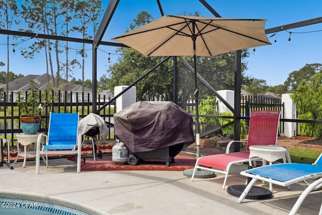 view of terrace featuring a grill