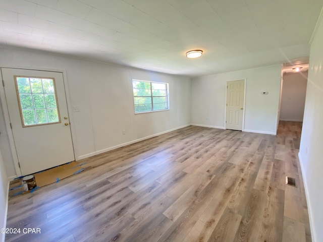 spare room with light wood-type flooring