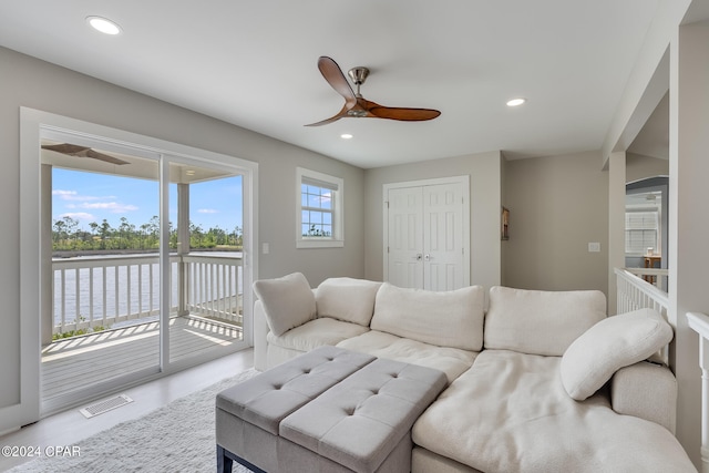 living room featuring ceiling fan