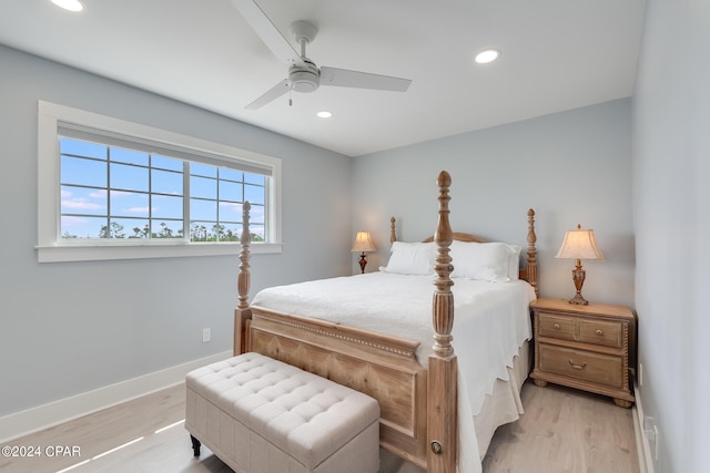 bedroom featuring light wood-type flooring and ceiling fan