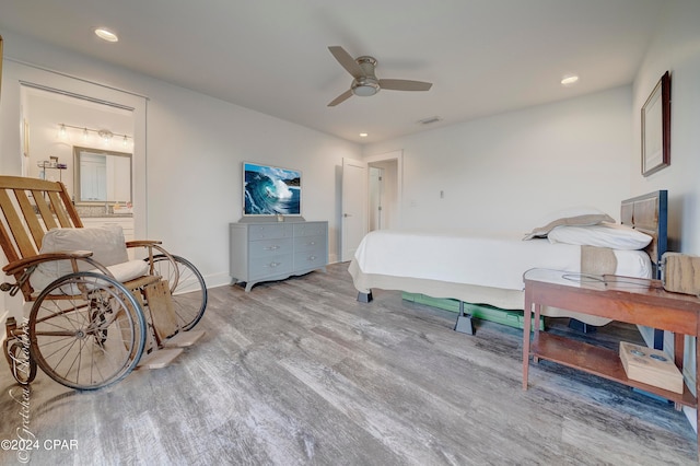 bedroom featuring wood-type flooring and ceiling fan