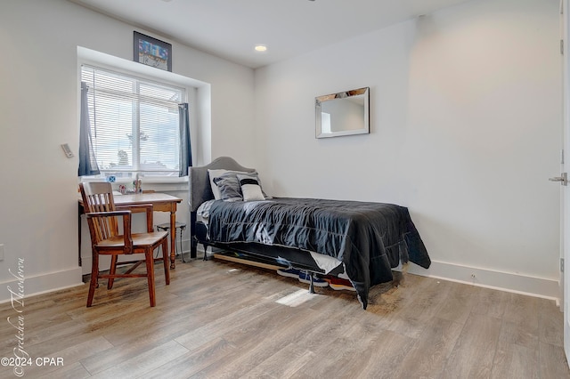 bedroom featuring light hardwood / wood-style floors