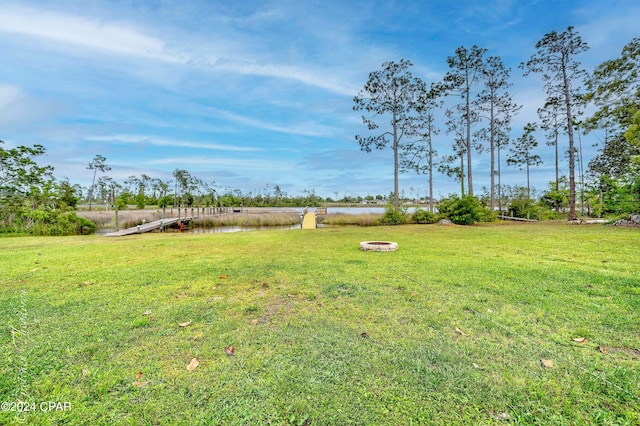 view of yard with a water view