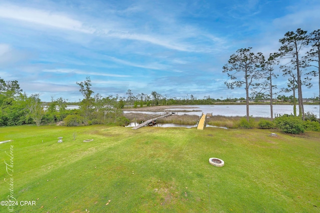 view of yard with a water view