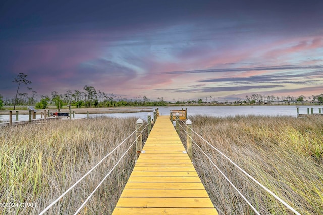 view of dock with a water view