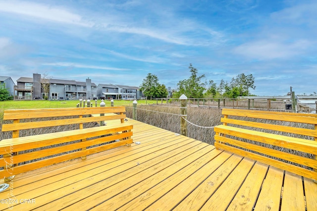 deck featuring a lawn