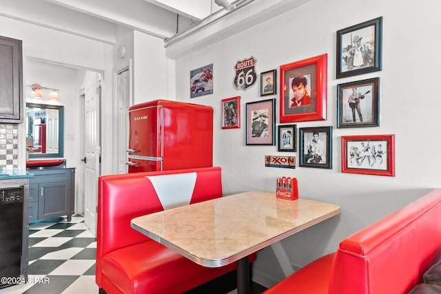 dining room featuring light tile floors