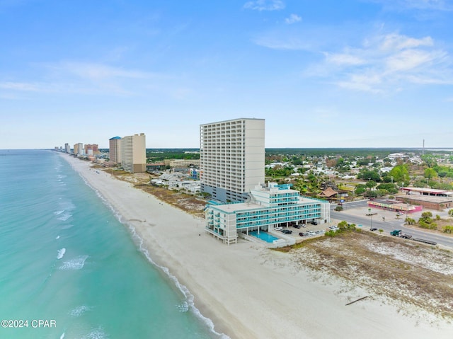 drone / aerial view with a view of the beach and a water view